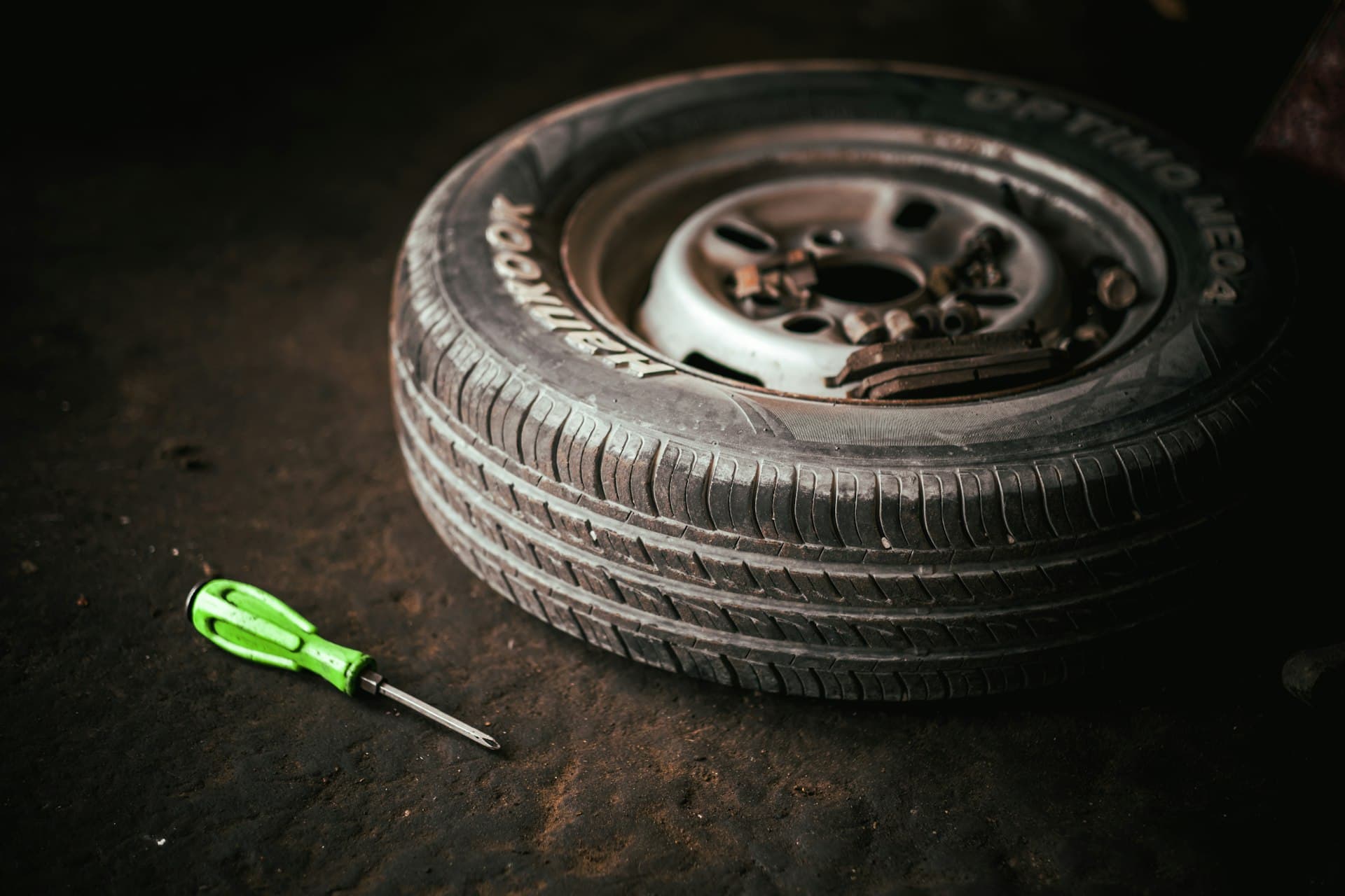 Mobile tyre fitting tools in a garage workshop